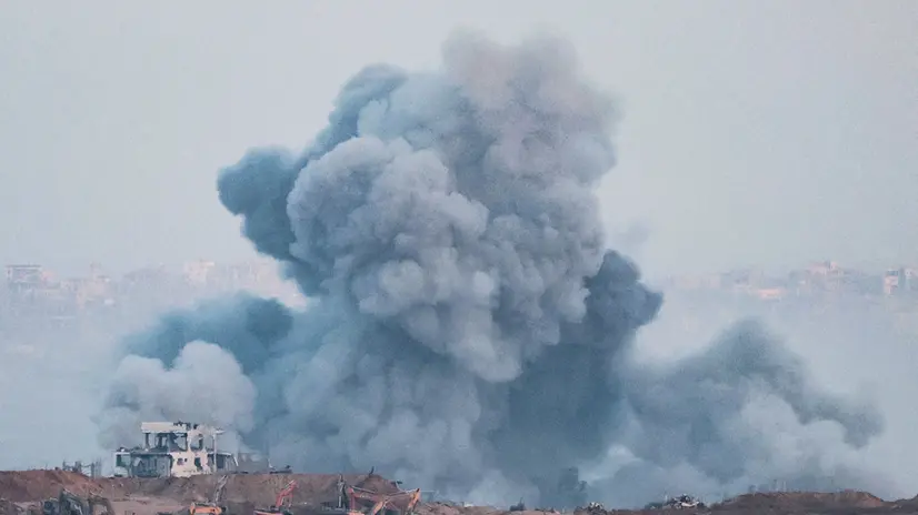 epaselect epa12234940 Smoke rises following an Israeli airstrike in the northern Gaza Strip near Beit Hanoun, as seen from the Israeli side of the border with the Gaza Strip in southern Israel, 13 July 2025. EPA/ABIR SULTAN