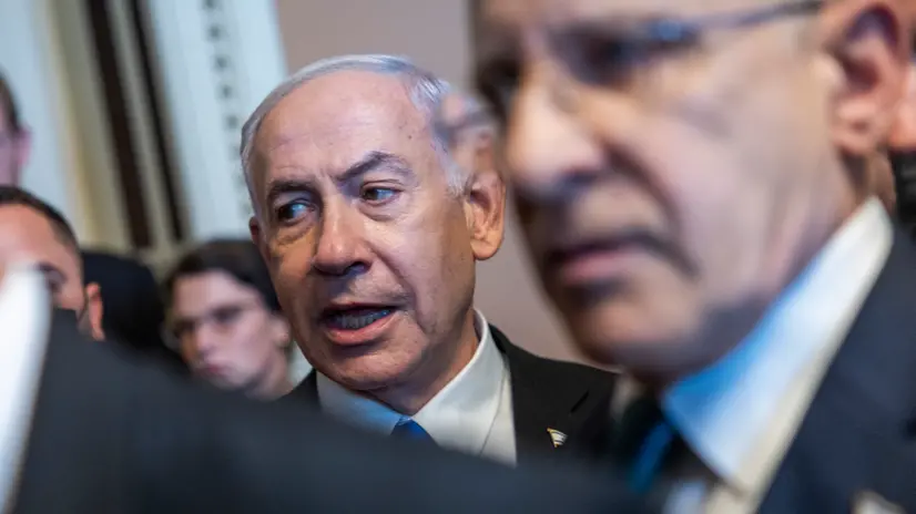 epa12227800 Israeli Prime Minister Benjamin Netanyahu (C) walks to a meeting with bipartisan Senate leadership in the US Capitol, in Washington, DC, USA 09 July 2025. EPA/SHAWN THEW
