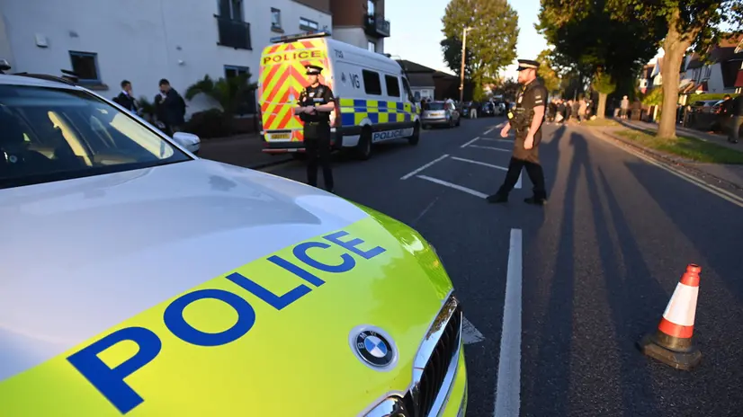 epa09525811 A police cordon at the scene of a crime where MP for Southend West, Sir David Amess, was stabbed to death in Leigh-on-Sea, Britain, 15 October 2021. Amess was reportedly stabbed several times at a church in Leigh-on-Sea while holding a constituency surgery and later died of his injuries. EPA/ANDY RAIN