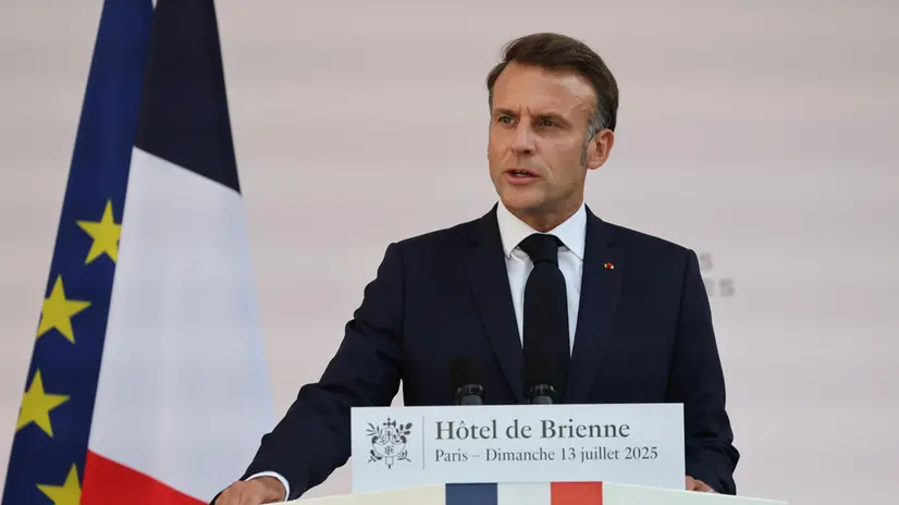 epa12236072 French President Emmanuel Macron delivers a speech to army leaders on the eve of the annual Bastille Day Parade, at the l’Hotel de Brienne in Paris, France, 13 July 2025. EPA/LUDOVIC MARIN / POOL MAXPPP OUT