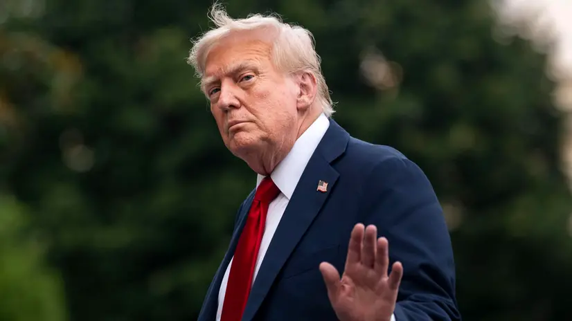 epa12236686 US President Donald Trump waves after exiting Marine One on the South Lawn of the White House in Washington, DC, USA, 13 July 2025. Trump is returning after attending the FIFA Club World Cup 2025 Final match between Chelsea FC and Paris Saint-Germain, in East Rutherford, New Jersey. EPA/BONNIE CASH / POOL