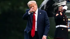 epa12236688 US President Donald Trump points after exiting Marine One on the South Lawn of the White House in Washington, DC, USA, 13 July 2025. Trump is returning after attending the FIFA Club World Cup 2025 Final match between Chelsea FC and Paris Saint-Germain, in East Rutherford, New Jersey. EPA/BONNIE CASH / POOL