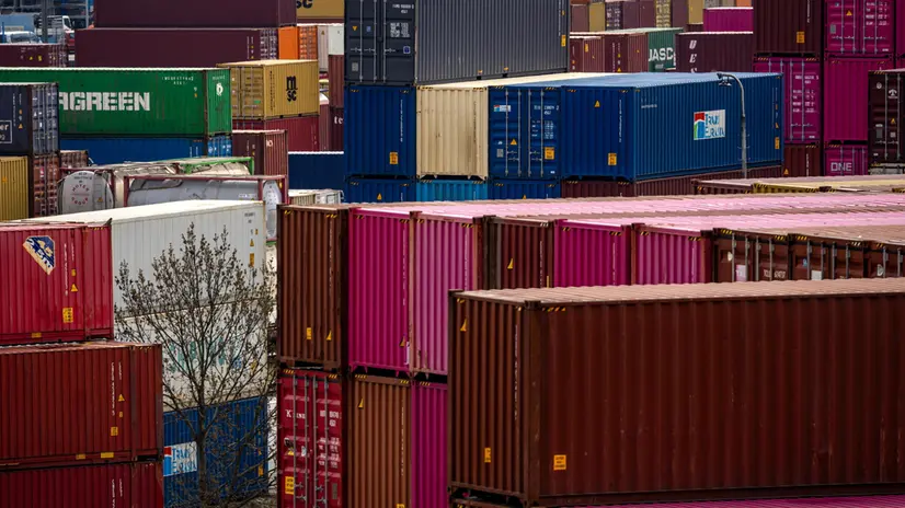 epa12031424 Containers are stacked at a transshipment terminal in Prague, Czech Republic, 14 April 2025. US President Trump initiated a trade war with most of America's trading partners, as several countries were granted a temporary tariffs exemption. EPA/MARTIN DIVISEK