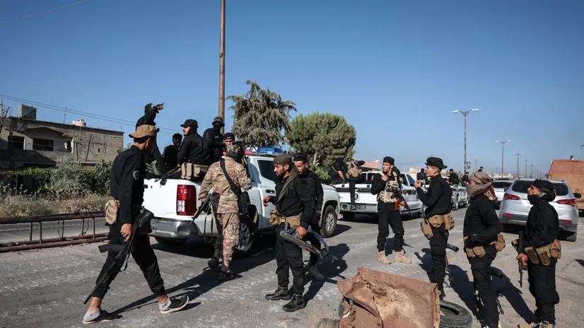 epa12237968 Syrian General Security Service deployed following clashes between Bedouin tribes and local fighters in the Druze-majority city of Sweida (Suwayda), southern Syria, 14 July 2025. According to the Syrian Observatory for Human Rights, dozens were killed in the clashes, including Syrian Caretaker Government forces. EPA/MOHAMMED AL RIFAI