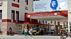 epa09422080 An exterior view of the General Calixto Garcia University Hospital, in Havana, Cuba, 19 August 2021 (issued 20 August 2021). Cuba faces the current outbreak of the pandemic, reflected in an average of 8,000 cases and 70 deaths a day, with a lack of oxygen, medicines and doctors, overcrowded hospitals and collapsed funeral services. The Caribbean country, of 11.2 million people, has the highest incidence rate of the disease in the Americas and one of the highest in the world with 1,173 infections per 100,000 inhabitants in the last 15 days, according to the Ministry of Health Public (Minsap). EPA/Ernesto Mastrascusa