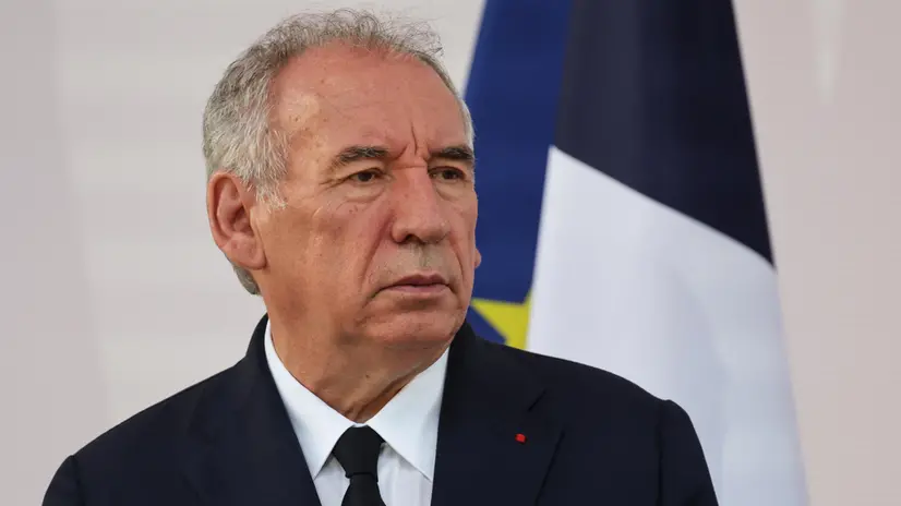 epa12236068 France's Prime Minister Francois Bayrou looks on as French President Emmanuel Macron delivers a speech to army leaders on the eve of the annual Bastille Day Parade, at the l’Hotel de Brienne in Paris, France, 13 July 2025. EPA/LUDOVIC MARIN / POOL MAXPPP OUT