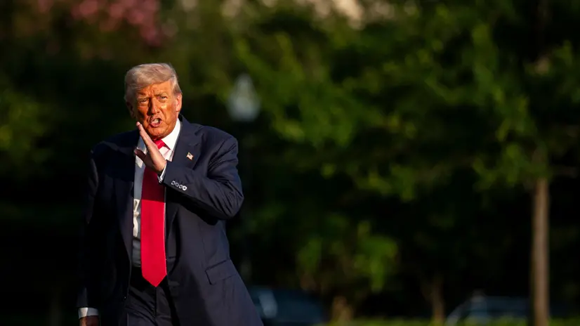epaselect epa12240022 US President Donald Trump walks on the South Lawn of the White House after arriving on Marine One in Washington, DC, USA, 15 July 2025. Trump hailed more than $92 billion US dollars in investments in artificial intelligence and energy infrastructure during a visit to Pennsylvania, highlighting his efforts to bolster US competitiveness in the AI field. EPA/Al Drago / POOL