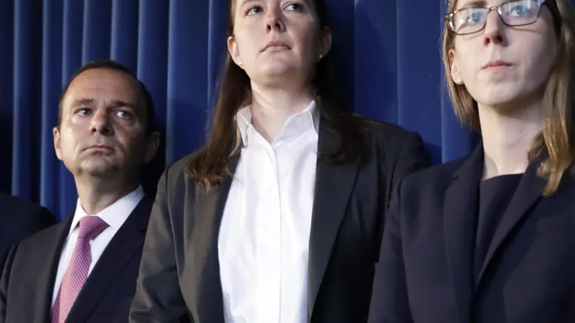 epa07703886 Assistant United States Attorney for the Southern District of New York Maurene Comey (C), daughter of former FBI director James Comey, during a news conference about the arrest of American financier Jeffrey Epstein in New York, USA, 08 July 2019. According to reports, US financier Jeffrey Epstein who was arrested on 08 July 2019 on sex trafficking and conspiracy charges, has been formally charged with two sex trafficking counts. EPA/JASON SZENES