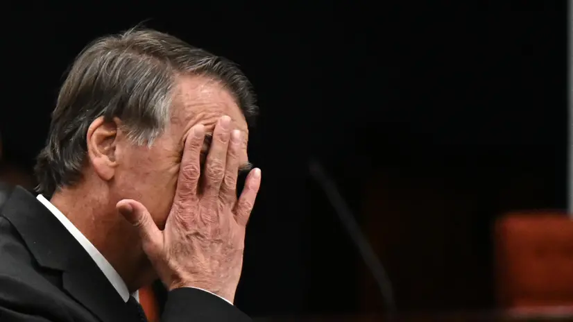 epa12168804 Former President of Brazil Jair Bolsonaro reacts during a session at the Supreme Court in Brasilia, Brazil, 10 June 2025. EPA/ANDRES BORGES