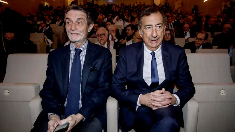 (da sx) Attilio Fontana e Giuseppe Sala durante la cerimonia di apertura dell'Anno Accademico 2023/2024 dell'Università IULM a Milano, 5 marzo 2024. ANSA/MOURAD BALTI TOUATI
