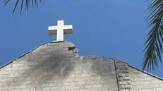 I danni alla chiesa cattolica di Gaza - Foto Ansa