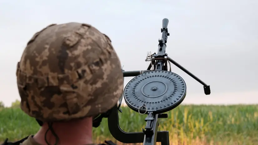 epa12238200 A Ukrainian soldier of the Kyiv Territorial Anti-Aircraft Defence prepares one of the Degtyarev light machine guns in the east of the region, Kyiv, Ukraine, 14 July 2025. The Kyiv Territorial Anti-Aircraft Defence team works from mobile positions where they operate a Browning M2 12.7 calibre heavy machine gun which they mainly use to shoot down Shahed drones during Russian air strikes. EPA/MARIA SENOVILLA