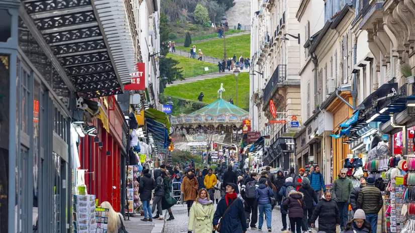 epa11882033 People stroll near the Sacre-Coeur Basilica in the Butte Montmartre neighbourhood in Paris, France, 07 February 2025 (issued 08 February 2025). Traffic restrictions, by making the streets more pedestrian-friendly, will be implemented by the City of Paris in the tourist destination of the upper Montmartre area of the city. The project intends to enhance the standard of living for locals in the popular area of Paris, which is home to famous sites like the Sacre-Coeur Basilica, the Place du Tertre, and the street where Picasso had his first Parisian studio. EPA/CHRISTOPHE PETIT TESSON