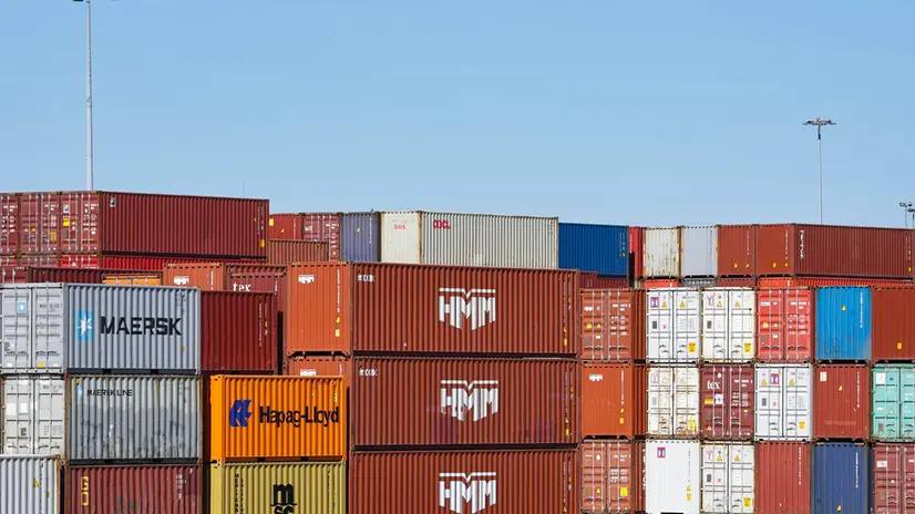 epa12015945 Shipping containers are stacked at the Duisport in Duisburg, Germany, 07 April 2025. On 02 April, US President Donald Trump announced a series of 'reciprocal tariffs' on US trading partners, including a 20 percent tariff on all imports from the European Union. EPA/CHRISTOPHER NEUNDORF