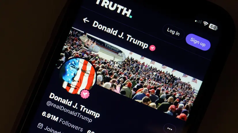 epa11255981 A photo illustration of former US President Donald Trump's account on social media platform Truth Social shown on a mobile phone in Washington, DC, USA, 02 April 2024. Stock in the parent company, Trump Media and Technology Group, fell sharply in the last 48 hrs after the organisation reported loses of $58 million last year. EPA/WILL OLIVER
