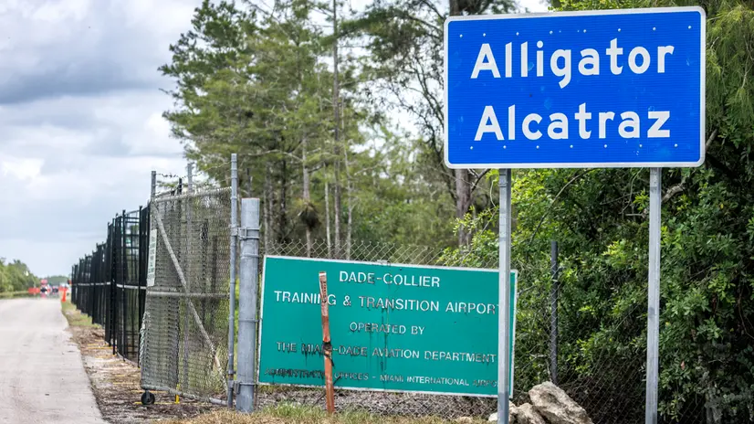 epa12238076 The new detention center Alligator Alcatraz's entrance in Ochopee, Florida, USA, 14 July 2025. Alligator Alcatraz is an immigration detention facility in southern Florida's Everglades, surrounded by Everglade's wildlife like alligators, Florida panthers and pythons, and snakes as a natural deterrent. EPA/CRISTOBAL HERRERA-ULASHKEVICH