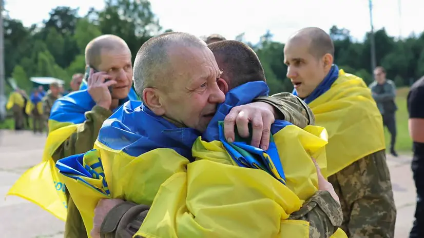 epa12199065 A handout photo made available by the Ukrainian Presidential Press Service shows Ukrainian prisoners of war (POWs) after being released in a prisoner swap with Russia, at an undisclosed location, Ukraine, 26 June 2025, amid the Russian invasion. This exchange follows an agreement reached after recent Russia-Ukraine talks in Turkey. According to the Coordination Headquarters for the Treatment of Prisoners of War, a significant portion of the released POWs had been in captivity since 2022. EPA/UKRAINIAN PRESIDENTIAL PRESS SERVICE HANDOUT -- MANDATORY CREDIT: UKRAINIAN PRESIDENTIAL PRESS SERVICE -- HANDOUT EDITORIAL USE ONLY/NO SALES