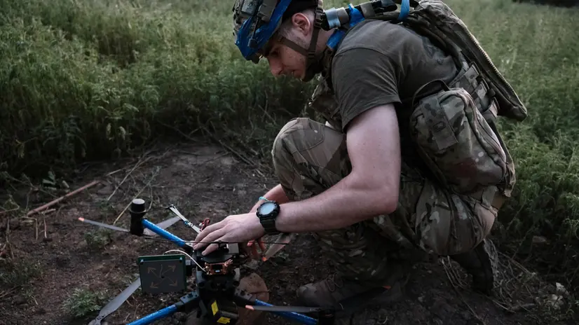 epa12256346 A Ukrainian drone pilot with the combat name 'Milton' from the 20th Lyubart Brigade of the 1st Corps of the National Guard Azov prepares the control drone with which he will guide FPV unmanned aerial vehicles on an attack mission on the Toretsk frontline, Donetsk region, Ukraine, 22 July 2025 (issued 23 July 2025). First Person View (FPV) drones have become one of the most widely used weapons by the Ukrainian and Russian armies in the conflict in Ukraine EPA/MARIA SENOVILLA