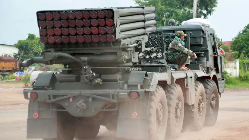 epa12259906 Cambodian soldiers ride on a self-propelled multiple rocket launcher in Oddar Meanchey province, Cambodia, 25 July 2025. Cambodian troops took position near the front line during fighting with Thai forces over a disputed border zone. EPA/KITH SEREY