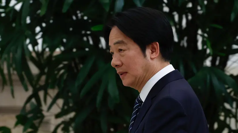 epa12118280 Taiwanese President William Lai (Lai Cheng-te) departs after his speech inside the presidential office building in Taipei, Taiwan, 20 May 2025. On his first year anniversary speech, Lai discussed various issues including cross strait politics and the economy. EPA/RITCHIE B. TONGO