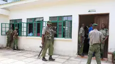 epa11087655 Members of the security forces guard the premises as 95 suspects, including ex-cult leader Paul Nthenge Mackenzie (not pictured), appear at the Shanzu Courts in Mombasa, Kenya, 18 January 2024. Mackenzie, founder of the Good News International Church, along with 94 co-defendants, were charged with terrorism-related crimes for the deaths of 429 of his followers whose bodies have been exhumed from the Shakahola forest in 2023. EPA/STR