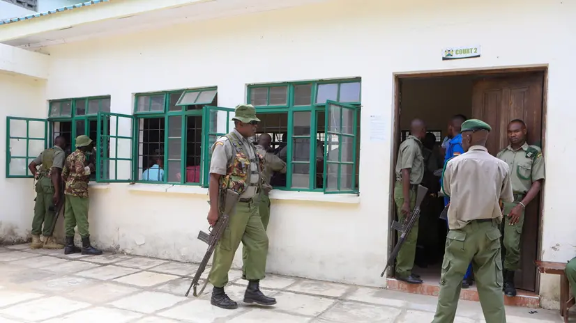 epa11087655 Members of the security forces guard the premises as 95 suspects, including ex-cult leader Paul Nthenge Mackenzie (not pictured), appear at the Shanzu Courts in Mombasa, Kenya, 18 January 2024. Mackenzie, founder of the Good News International Church, along with 94 co-defendants, were charged with terrorism-related crimes for the deaths of 429 of his followers whose bodies have been exhumed from the Shakahola forest in 2023. EPA/STR