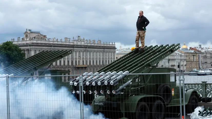 epa12199158 Workers load pyrotechnic charges into a Soviet World War II-era rocket launcher known as the BM-13, nicknamed ‘Katyusha,’ during preparations for the Scarlet Sails celebration in St. Petersburg, Russia, 26 June 2025. The traditional celebration is organized in honor of students of elementary and high schools, as well as military academies, as they finish their educational terms and hold graduation ceremonies in the second-largest city of Russia. EPA/ANATOLY MALTSEV