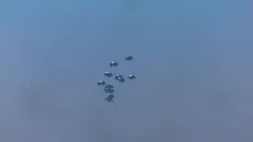 epa12265459 Humanitarian aid is airdropped over the northern part of the Gaza Strip by the Royal Jordanian Army, as seen from Sderot, southern Israel, 27 July 2025. More than 130 Palestinians, the majority of whom children, have died of malnutrition in the Gaza Strip, the Palestinian Ministry of Health said on 27 July. EPA/ATEF SAFADI