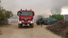 Vigili del fuoco impegnati in Sardegna - Foto d'archivio Ansa © www.giornaledibrescia.it