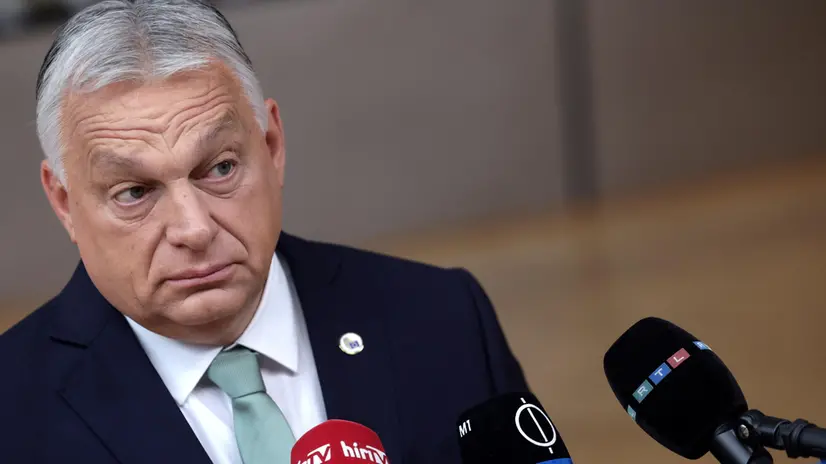 epa12198116 Hungary's Prime Minister Viktor Orban talks to the media as he arrives to attend the EU leaders' Summit in Brussels, Belgium, 26 June 2025. EU leaders gather for a two-day summit to address geoeconomic challenges and the ongoing developments in Ukraine and the Middle East, among other topics. EPA/OLIVIER MATTHYS