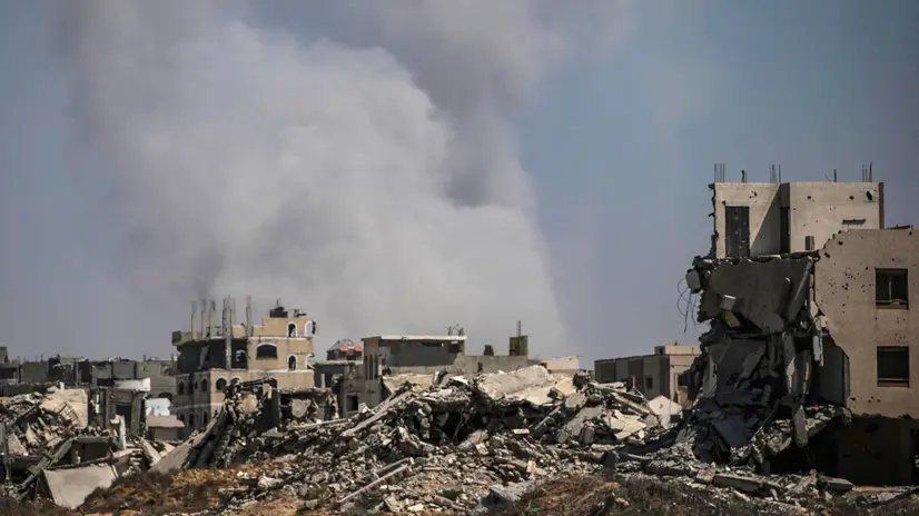 epa12249922 Smoke rises following an israeli air strike near Zikim, northern Gaza Strip, 20 July 2025. According to the Palestinian Ministry of Health in Gaza, at least 67 people were killed while trying to receive humanitarian aid in the Zikim area. EPA/MOHAMMED SABER