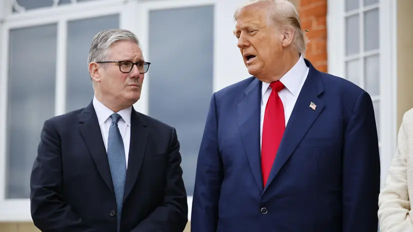 epa12268496 British Prime Minister Keir Starmer (L) and US President Donald J. Trump (R) pose for pictures ahead of their meeting at the Trump Turnberry golf resort in Turnberry, Scotland, Britain, 28 July 2025. US President Trump is on a private trip to Scotland to visit his golf courses. EPA/TOLGA AKMEN/POOL / POOL