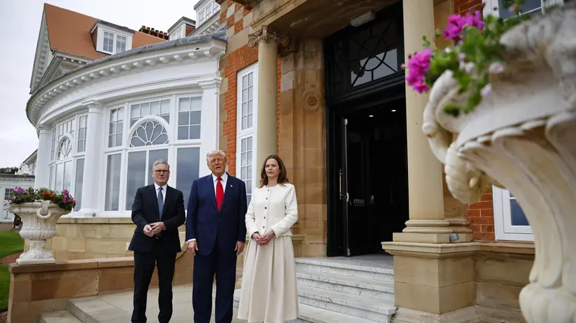 epa12268495 (L-R) British Prime Minister Keir Starmer, US President Donald J. Trump and Victoria Starmer pose for pictures ahead of the leader's meeting at the Trump Turnberry golf resort in Turnberry, Scotland, Britain, 28 July 2025. US President Trump is on a private trip to Scotland to visit his golf courses. EPA/TOLGA AKMEN/POOL / POOL