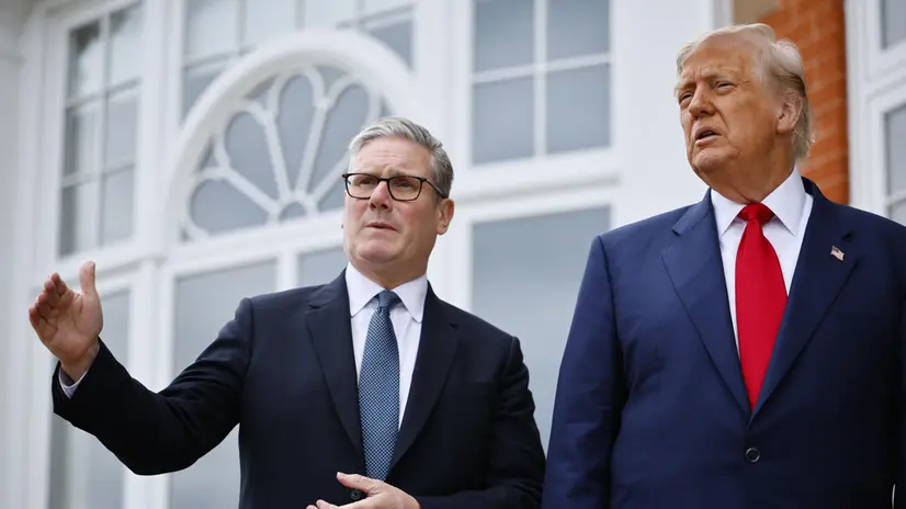 epa12268497 British Prime Minister Keir Starmer (L) and US President Donald J. Trump (R) pose for pictures ahead of their meeting at the Trump Turnberry golf resort in Turnberry, Scotland, Britain, 28 July 2025. US President Trump is on a private trip to Scotland to visit his golf courses. EPA/TOLGA AKMEN/POOL / POOL