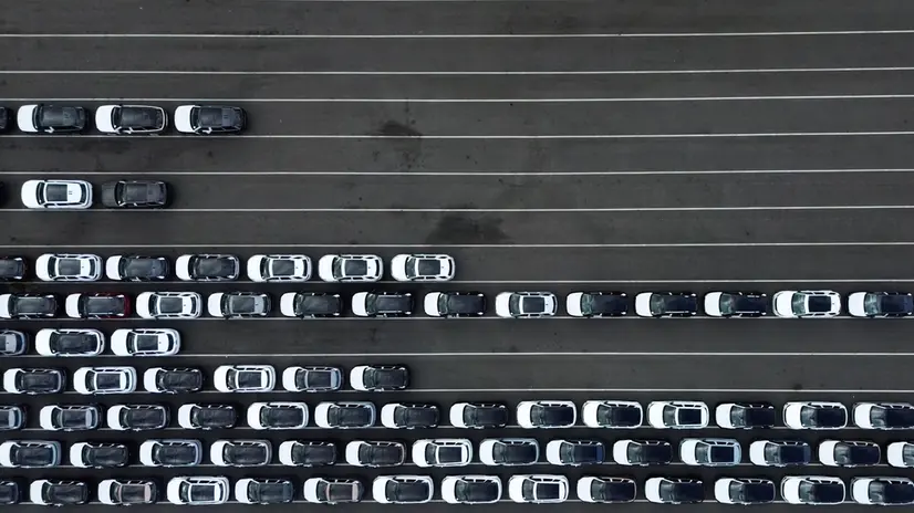 epaselect epa11880909 An aerial photograph taken with a drone of cars and lined up for export at Seaforth Dock container terminal in Liverpool, Britain, 07 February 2025. US President Donald Trump has imposed 10 percent tariffs on China, with planned tariffs on Mexico and Canada being delayed after last minute talks. The US President has said that tariffs may also be imposed on the EU and the UK, which exports goods and services including energy, cars, machinery and pharmaceuticals to the US. EPA/ADAM VAUGHAN