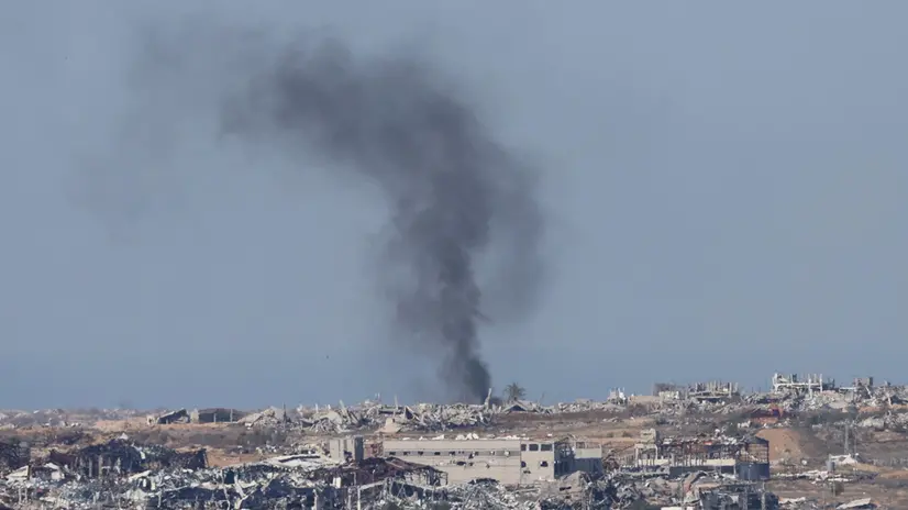 epa11835592 Smoke rises from the ruins of damaged buildings in the Gaza Strip, as seen from an undisclosed location at the Israeli-Gaza border in southern Israel, 19 January 2025, before a ceasefire in Gaza is set to come into effect. Israel and Hamas agreed on a hostage release deal and a Gaza ceasefire to be implemented on 19 January 2025. More than 46,000 Palestinians have been killed in the Gaza Strip, according to the Palestinian Ministry of Health, since Israel launched a military campaign in the strip in response to a cross-border attack led by the Palestinian militant group Hamas on 07 October 2023, in which about 1,200 Israelis were killed and more than 250 taken hostage. EPA/ABIR SULTAN
