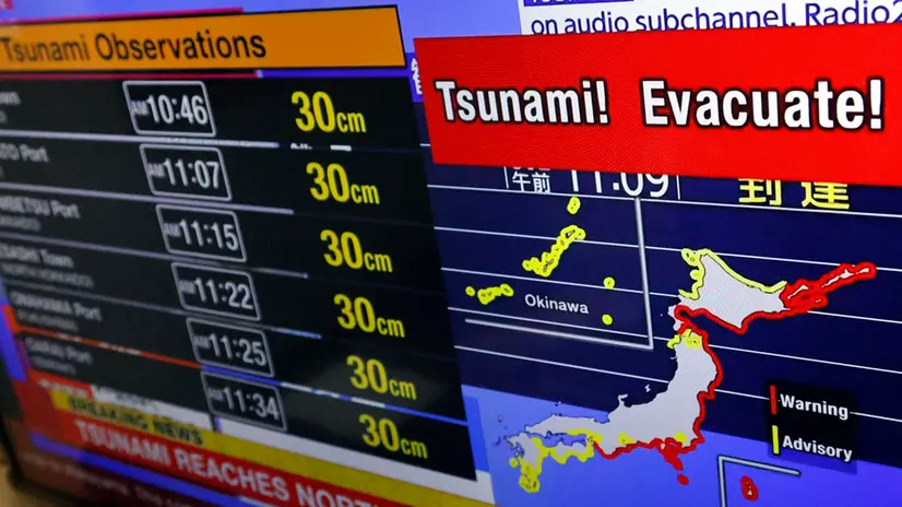 epa12271675 A television screen shows a news report from the Japanese Meteorological Agency following a 8.8 magnitude quake occured off the Kamchatka Peninsula, in Tokyo, Japan, 30 July 2025. The Japan Meteorological Agency issued a tsunami warning after the M8.8 quake hit off the Kamchatka Peninsula. EPA/JIJI PRESS JAPAN OUT EDITORIAL USE ONLY/