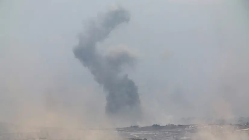epa12271052 Smoke rises as a result of an Israeli airstrike in the northern part of the Gaza Strip, near Gaza City, as seen from the Israeli side of the Israel-Gaza border, 29 July 2025. EPA/ATEF SAFADI