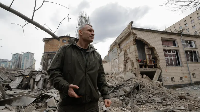 epa11242697 Mayor of Kyiv Vitali Klitschko inspects the site of a damaged building after a rocket strike in Kyiv, Ukraine, 25 March 2024, amid the Russian invasion. A three-story building housing a gym was damaged as a result of the morning rocket attack which hits Kyiv. At least nine people were injured according to the State Emergency Service. Russian troops entered Ukrainian territory on 24 February 2022, starting a conflict that has provoked destruction and a humanitarian crisis. EPA/SERGEY DOLZHENKO