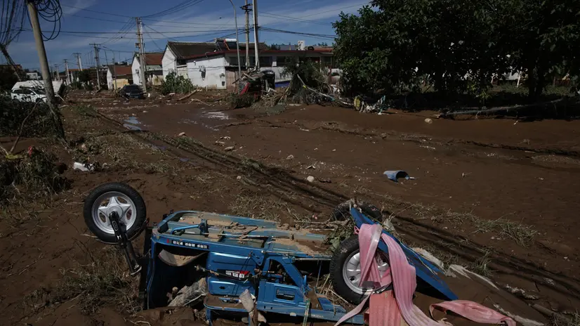 epa12272811 A view of debris on the street following flooding in the district of Miyun, Beijing, China, 30 July 2025. At least 30 people have died, and thousands have been evacuated after heavy rains have caused infrastructural damage and power outages over the last days. EPA/ANDRES MARTINEZ CASARES