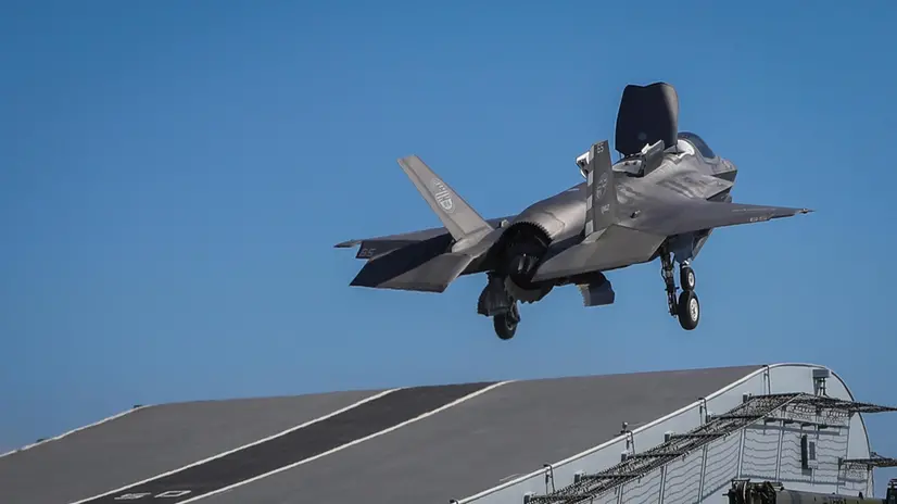 epa07055929 A handout picture provided by the British Ministry of Defence (MOD) showing Royal Navy Commander, Nathan Gray making the first ever F-35B Lightning II jet take off from, the British Royal Navy aircraft carrier, HMS Queen Elizabeth at sea on 26 September 2018, (issued 29 September 2018). the MOD report that two F-35B Lightning II fighter jets have successfully landed onboard HMS Queen Elizabeth for the first time, laying the foundations for the next 50 years of fixed wing aviation in support of the UKâs Carrier Strike Capability. Royal Navy Commander, Nathan Gray, 41, made history by being the first to land on, carefully manoeuvring his stealth jet onto the thermal coated deck. He was followed by Squadron Leader Andy Edgell, RAF, both of whom are test pilots, operating with the Integrated Test Force (ITF) based at Naval Air Station Patuxent River, Maryland. Shortly afterwards, once a deck inspection has been conducted and the all-clear given, Cdr Gray became the first pilot to take off using the shipâs ski-ramp. EPA/PO ARRON HOARE /BRITISH MINISTRY OF DEFENCE/HANDOUT MANDATORY CREDIT: CROWN COPYRIGHT HANDOUT EDITORIAL USE ONLY/NO SALES *** Local Caption *** Stills grab from video