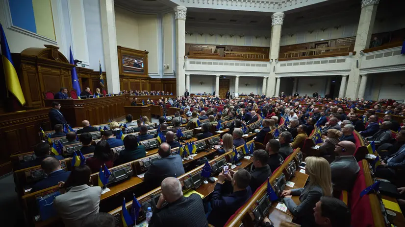 epa11728720 A handout photo made available by the Presidential Press Service showing Ukraine's President Volodymyr Zelensky presenting his plan of resistance to the Ukrainian parliament in Kyiv, Ukraine, 19 November. Zelensky said that Ukraine will never give in to Russia's aggression as it marks 1,000 days since the Kremlin launched a full-scale invasion of the country. EPA/HANDOUT HANDOUT EDITORIAL USE ONLY/NO SALES