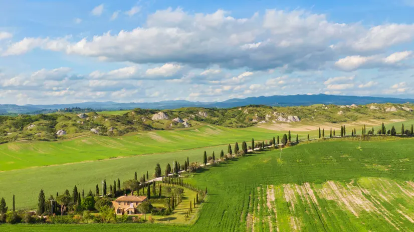 Landscape of Crete Senesi, with a farm with cypress trees lines, surrounded by Accona desert, central Tuscany, near ancient and historical Francigena's way, where the famous colors of the spring come out. Valdorcia lands has recognized since 2004 by Unesco as world humanity patrimony, gathering thousands of tourists every years on four seasons from all over the world, during the lockdown phase 2 emergency period aimed to conserve low spread level of Covid-19 coronavirus and open more free circulation of people, Leonina, Italy, 07 May 2020. (ANSA foto Fabio Muzzi)