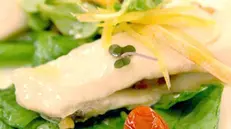 Il coregone cucinato con un filo d'olio extra vergine del Garda
