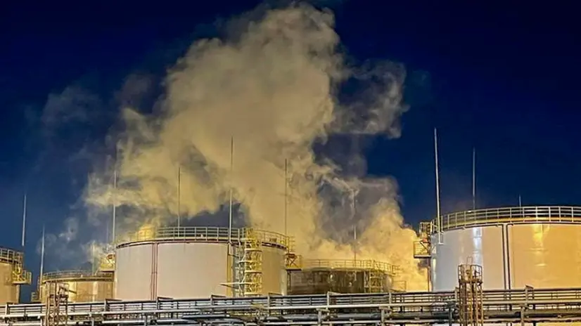 epa10607926 A handout photo made available by Krasnodar region governor's press service shows smoke rising from a fire site at an oil refinery in the southern Krasnodar region's Ilsky settlement, Russia, 04 May 2023. A tank with oil products caught fire at the refinery following a drone attack. A total of 167 people and 39 pieces of equipment were involved in extinguishing the fire which, at 04:20 Moscow time, was localized to an area of 400 sq.m. There were no dead or injured. EPA/Krasnodar region governor's press service HANDOUT EDITORIAL USE ONLY/NO SALES
