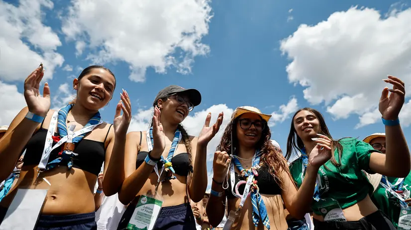 Faithful attends the prayer vigil presided over by Pope Leo XVI for the Jubilee of Youth, at Tor Vergata, in Rome, Italy, 02 August 2025. ANSA/ANGELO CARCONI