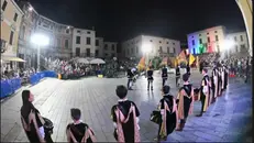 Figuranti in piazza in una passata edizione delle Quadre © www.giornaledibrescia.it