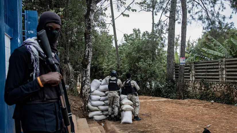 epa12197655 Members of the Haitian National Police (PNH) protect the advance of a patrol composed of four armored vehicles with Kenyan police officers in Puerto Principe, Haiti, 24 June 2025 (issued 25 June 2025). Haiti marks one year since the first contingent of the Multinational Security Support (MSS) Mission arrived in the Caribbean country on 25 June 2024. UN High Commissioner for Human Rights Volker Turk has said the shortfalls in resources and equipment limited the MSS ability to contain the violence, with gangs extending their reach beyond Port-au-Prince and into the central regions, leaving a record 1.3 million people displaced and at least 2,680 people were killed between 01 January and 30 May 2025. EPA/MENTOR DAVID LORENS