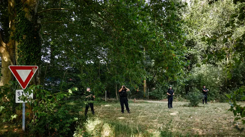 epa12215644 French riot police stand near the A69 highway construction site between Toulouse and Castres, near Castres, France, 04 July 2025, one day before an upcoming demonstration by opposing activists. The administrative appeal court in Toulouse authorized the resumption of construction work on the controversial motorway project in May 2025, following a three-month halt. EPA/YOAN VALAT