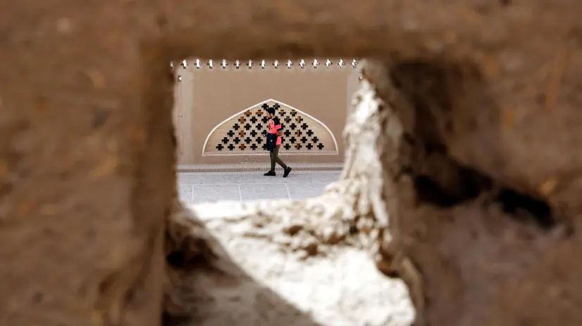 epa07250689 A tourist visits the UNESCO World Heritage Site citadel Arg-e Bam during the 15th anniversary of the earthquake in the city of Bam, Kerman province, southeast Iran, 27 December 2018. The Arg-e Bam and the city of Bam in southeast Iran was devastated early 26 December 2003 by earthquake with a magnitude of 6.3 on the Richter scale. According to official figures, 15 years after earthquake which has destroyed main part of the Arg-e Bam, the rebuilding process still going on but slowly due to financial crisis, with some officials mentioning that beside the very sensitive process of rebuilding, the US sanctions against the country with the economic crisis has made the rebuilding process goes slowly. EPA/ABEDIN TAHERKENAREH